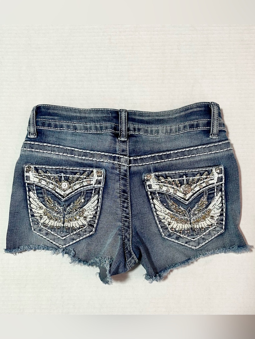 Telepatía Low Rise Blue Denim Jean Shorts
